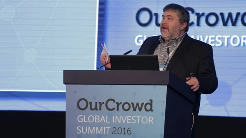 Jonathan Medved, founder and CEO of OurCrowd, the leading global-equity crowdfunding platform for accredited investors, speaks at the OurCrowd Global Investor Summit in Jerusalem. Credit: Courtesy.
