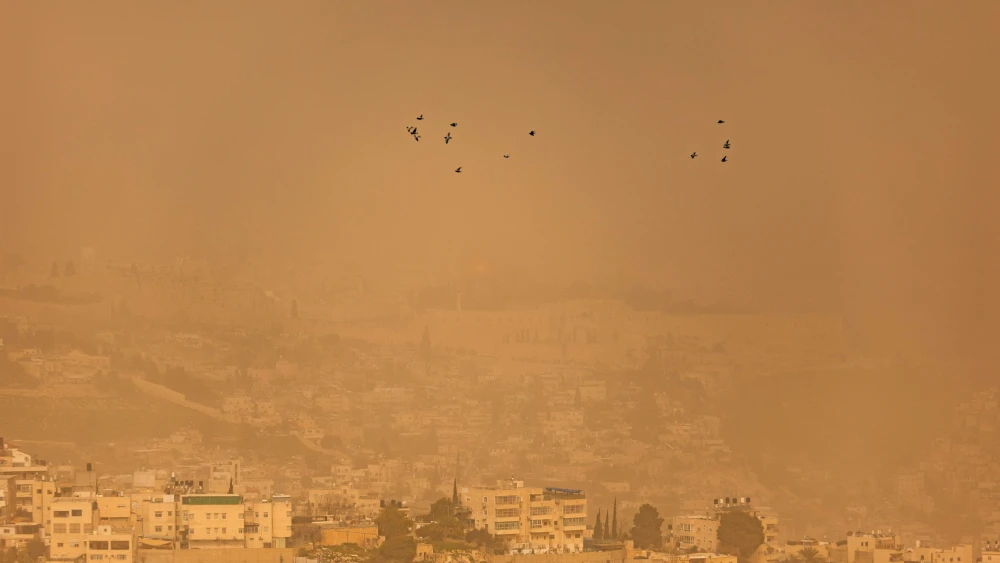 A view of the Old City of Jerusalem from the Armon Hanatziv Promenade on a hazy winter day, Feb. 14, 2026. Photo by Yonatan Sindel/Flash90.