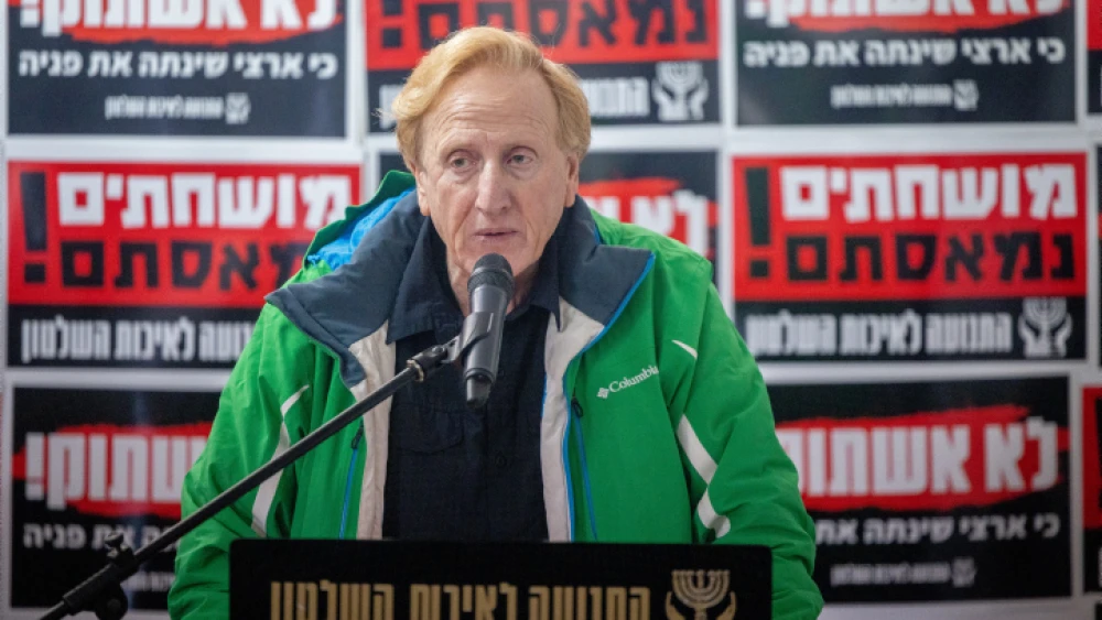 Eliad Shraga, founder of the Movement for Quality of Government in Israel, addresses a press conference at his group's protest tent against the proposed changes to the legal system, outside the Supreme Court in Jerusalem, Feb. 2, 2023. Photo by Yonatan Sindel/Flash90.