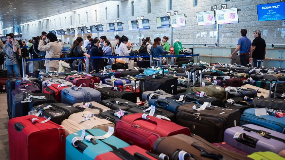 Travellers at Ben Gurion International Airport where flights were being delayed, as the workers of the airport went on strike, in a protest for the release of Israelis held hostage by Hamas terrorists in Gaza, on Sept. 2, 2024. Photo by Avshalom Sassoni/Flash90.