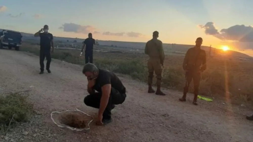 Israeli security forces examine the exit point of a tunnel used by six Palestinian terrorists to escape from Gilboa Prison in northern Israel, Sept. 6, 2021. Source: Twitter.