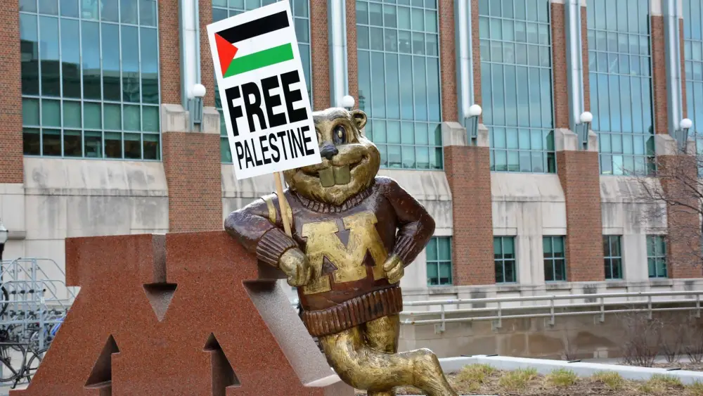 A “Free Palestine” sign on display with the University of Minnesota's gopher mascot that was erected by the school's Students for Justice in Palestine chapter. Source: SJP via Facebook.