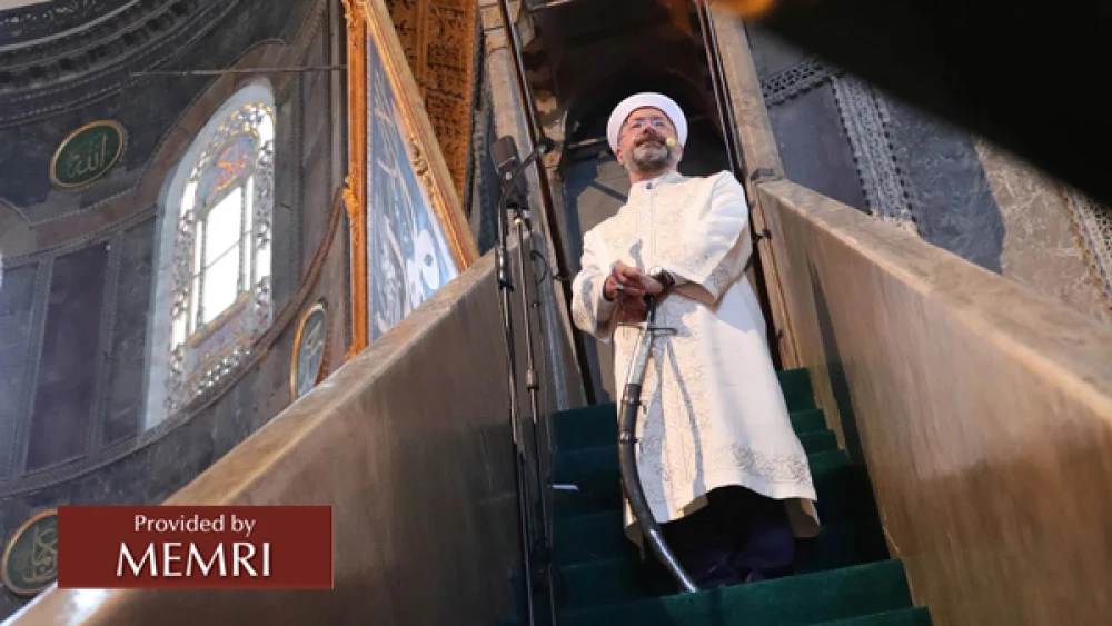 Turkey’s top Muslim cleric, professor Ali Erbaş, holds a sword on his way to deliver a Friday sermon the Hagia Sophia mosque in Istanbul on July 24, 2020. Credit: MEMRI.