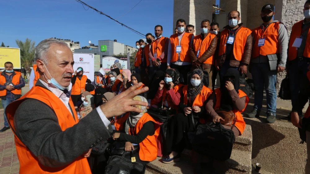 Palestinian Central Election Commission workers register citizens in Rafah in preparation for planned May elections in the southern Gaza Strip, on Feb. 10, 2021. Photo by Abed Rahim Khatib/Flash90.