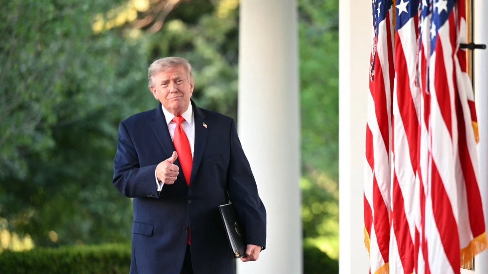 U.S. President Donald Trump arrives to speak during a Rose Garden Club dinner with American farmers at the White House in Washington, DC, on June 25, 2026. Photo by Mandel NGAN / AFP via Getty Images.