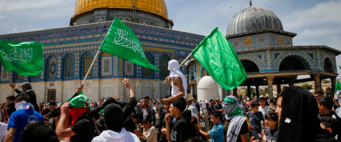 Palestinians fly Hamas flags after Ramadan prayers at the Al-Aqsa mosque on the Temple Mount in Jerusalem, April 22, 2022. Photo by Jamal Awad/Flash90.