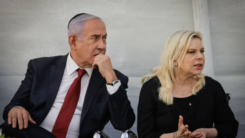 Israeli Prime Minister Benjamin Netanyahu and his wife, Sara, attend a memorial ceremony for Netanyahu's brother, Yoni Netanyahu, at the Mount Herzl Military Cemetery, in Jerusalem, on June 16, 2021. Photo by Olivier Fitoussi/Flash90.