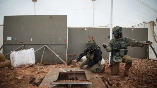 Israeli soldiers stand near a Hezbollah tunnel that crosses from Lebanon to Israel, on the border near Metula in northern Israel, on Dec. 24, 2018. Credit: Hadas Parush/Flash90.