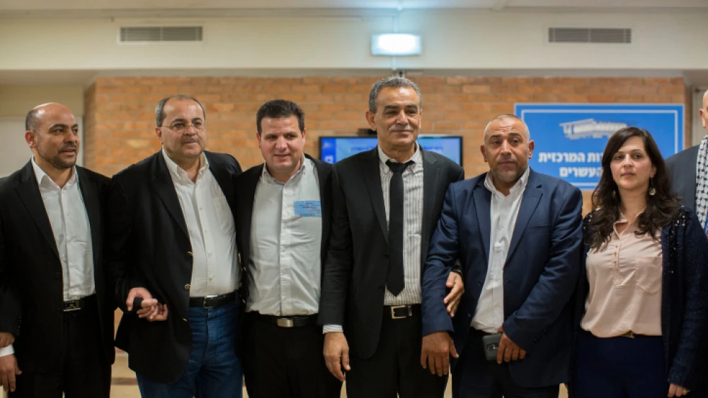 Joint Arab List members pose for a picture outside a committee meeting prior to Israel's March 2015 general election, on January 28, 2015. Photo by Yonatan Sindel/Flash90.