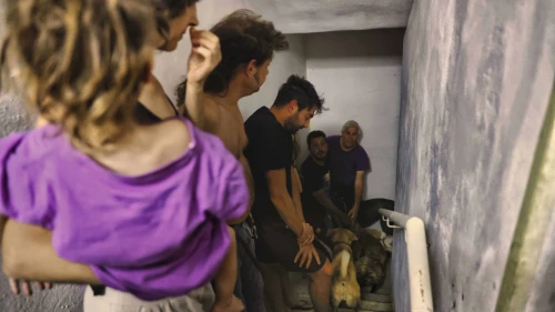 Israelis take cover as air-raid sirens are activated in Tel Aviv, Oct. 23, 2024. Photo by Yehoshua Yosef/Flash90.