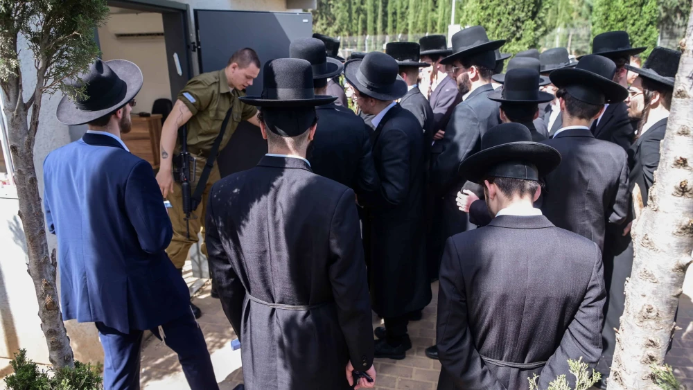 Haredi Jews arrive to the IDF Recruitment Center at Tel Hashomer in central Israel on March 28, 2024. Photo by Avshalom Sassoni/Flash90.