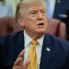 U.S. President Donald Trump speaks to the media after signing an executive order establishing the President's Military Spouse Commission in the Oval Office at the White House on Aug. 3, 2026 in Washington, DC. Photo by Chip Somodevilla/Getty Images.