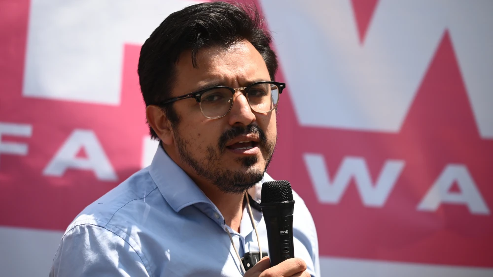 Byron Sigcho-Lopez, alderman of Chicago's 25th Ward, speaks during a rally outside the National Restaurant Association trade show in Chicago, Ill., on May 22, 2023. Photo by Daniel Boczarski/Getty Images for One Fair Wage.