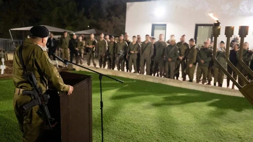 Israel Defense Forces Chief of Staff Lt. Gen. Eyal Zamir lights the first Chanukah candle with troops of the 91st Division, Dec. 14, 2025. Credit: IDF.