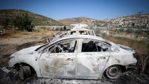 Burned cars in the village of Al-Lubban, next to the Israeli community of Eli. Photo by Flash90.