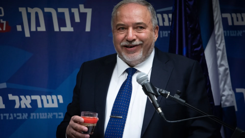 Yisrael Beiteinu Party head Avigdor Lieberman speaks with the media during a faction meeting in Knesset on Dec. 2, 2019. Photo by Hadas Parush/Flash90.