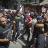 Palestinians attend the funeral of Samir Zakaria Abu Dalal, who was killed in an Israeli strike in Gaza City on Aug. 4, 2026. Photo by Ali Hassan/Flash90.