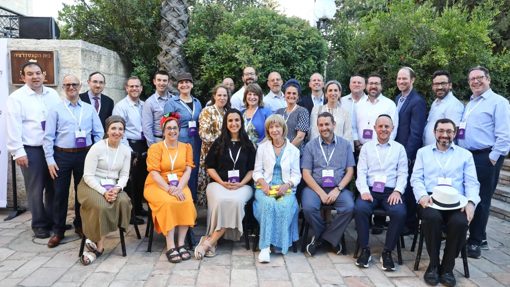 Scholars from around the world attend a conference in Jerusalem to further the legacy of the late Rabbi Jonathan Sacks, together with his wife, Lady Elaine Sacks (front row, center). Photo: Yonit Schiller.