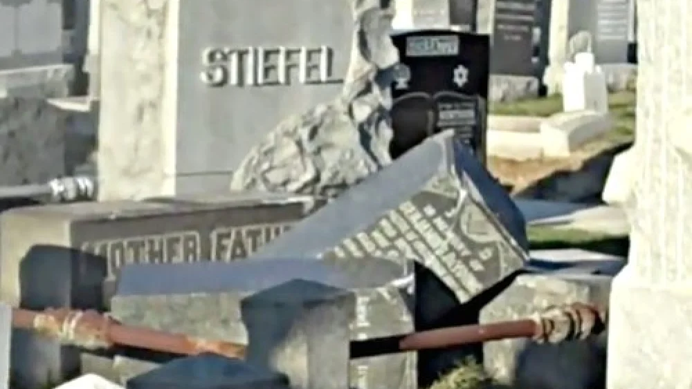 Overturned headstones at Washington Cemetery, a Jewish cemetery in Brooklyn, N.Y., in December 2010. Credit: YouTube.