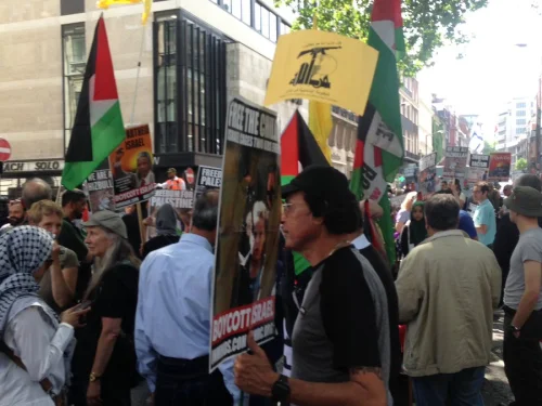 A Hezbollah flag during “Al-Quds Day” demonstrations on the streets of London, 2018. Credit: Zionist Federation via Twitter.