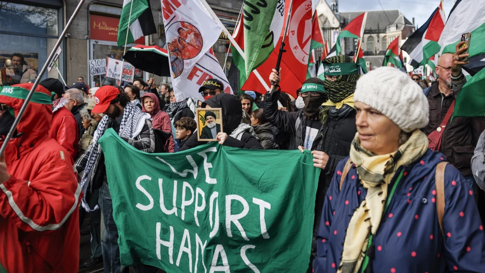Protesters carry a 'We support Hamas' banner during an anti-Israel protest on Dam Square in Amsterdam, the Netherlands, on Oct. 11, 2026. Photo by Koen van Weel / ANP / AFP via Getty Images / Netherlands OUT
