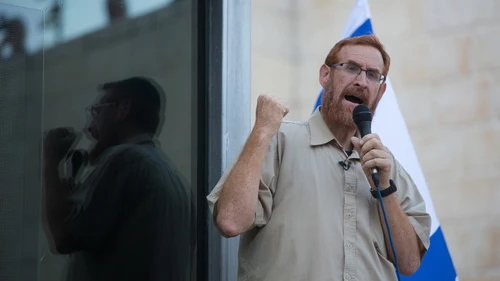 Click photo to download. Caption: Rabbi Yehudah Glick speaks during a protest outside the Temple Mount in Jerusalem on July 14, 2015, following the closing of the Temple Mount to Jews until the end of the Muslim holy month of Ramadan. Credit: Yonatan Sindel/Flash90.