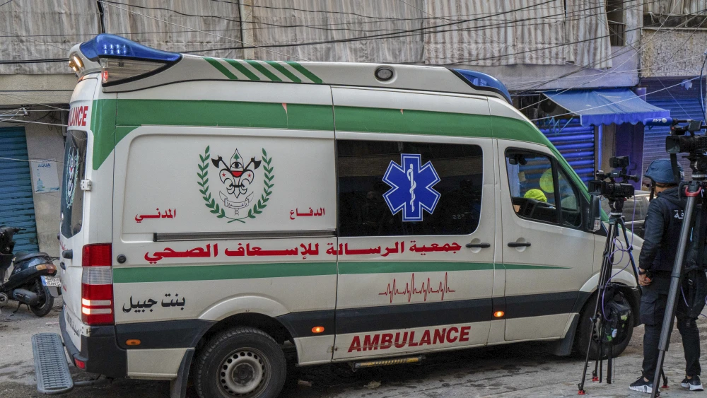 An ambulance on the site of the israeli strike that targeted Basta in central Beirut. Photo by Nael Chahine/Middle East Images/AFP via Getty Images.