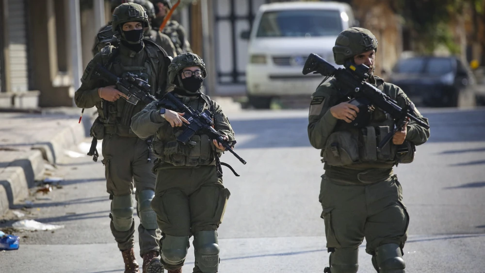 Israeli soldiers raid the Samaria city of Qalqilya, Dec. 4, 2025. Photo by Nasser Ishtayeh/Flash90.