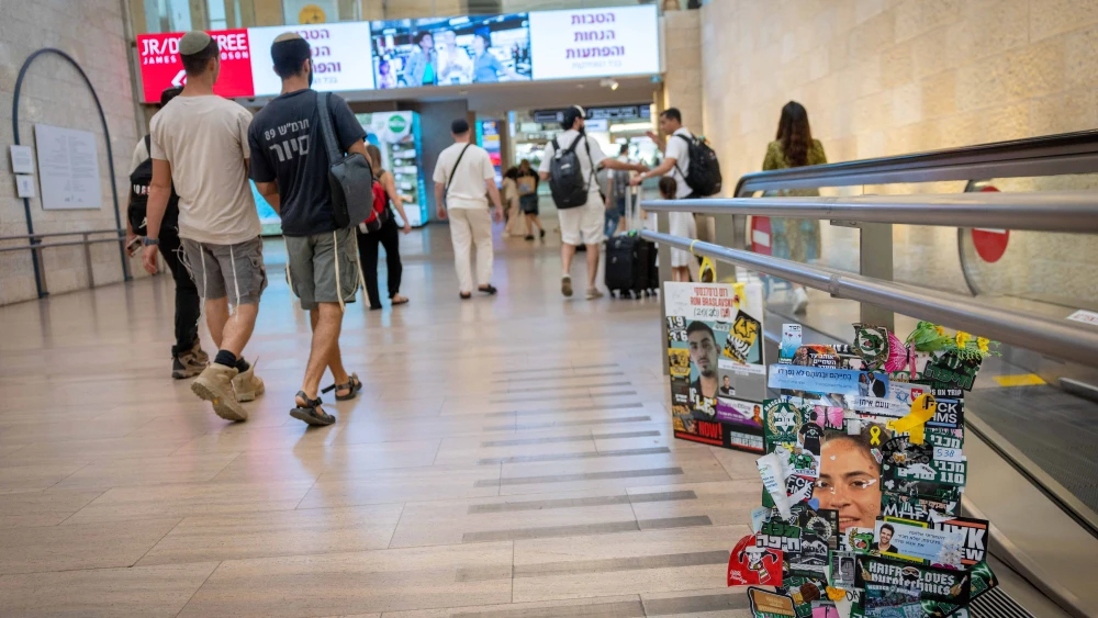 Posters of Israelis held hostage by Hamas in Gaza are displayed at Ben Gurion International Airport, near Tel Aviv, July 13, 2025. Photo by Chaim Goldberg/Flash90.