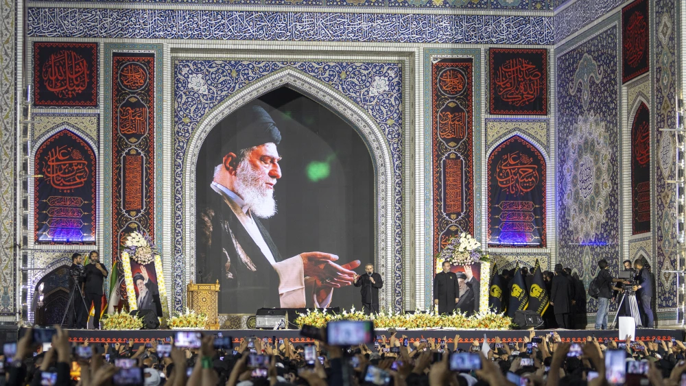 Iranian mourners gather for the burial of slain Supreme Leader Ali Khamenei at the Imam Reza Shrine in Mashad, July 9, 2026. Photo by Majid Saeedi/Getty Images.