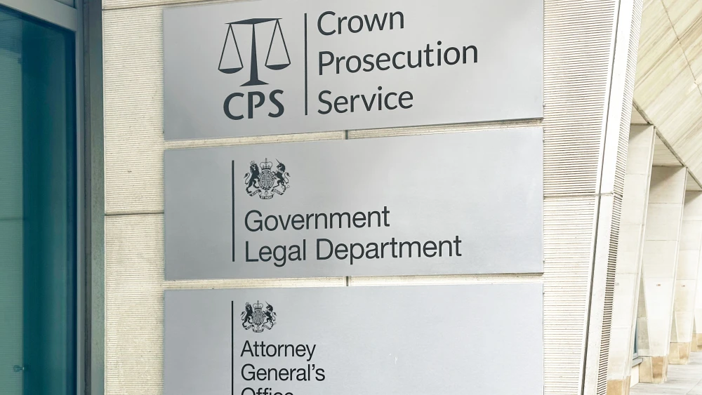 The Crown Prosecution Service (CPS), Government Legal Department, Attorney General's Office signs are seen outside their building on Petty France on Oct. 15, 2024 in Whitehall, London, United Kingdom. Photo by Peter Dazeley via Getty Images.