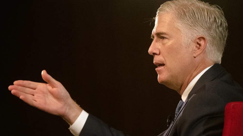U.S. Supreme Court Justice Neil Gorsuch speaks at the LBJ Presidential Library in Austin, Texas, as the sixth annual Tom Johnson lecturer on Sept. 19, 2019. The lectureship was established in 2010 for Johnson’s 30 years of distinguished service as chairman of the Lyndon Baines Johnson Foundation Board of Trustees. He served as executive assistant to the president, and later, as president and chairman of CNN. Credit: Jay Godwin/Flickr/Public Domain via Wikimedia Commons.