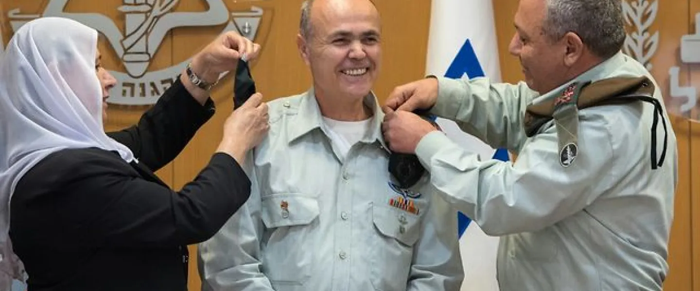 Kamil Abu Rokon receives the rank of major general from IDF Chief of Staff Gadi Eizenkot, right, and Abu Rokon's wife in a ceremony at IDF headquarters in Tel Aviv on March 29, 2018. Credit: IDF Spokesperson's office.