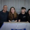 Nissim and Ricarda Louk at their daughter Shani Louk's funeral in Srigim, west of Jerusalem, on May 19, 2024. Photo by Chaim Goldberg/Flash90.