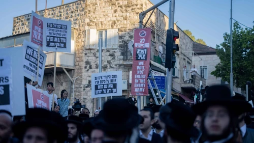 Ultra-Orthodox extremists attend a rally in Jerusalem's Mea Shearim neighborhood against the enlistment of haredi Jews into the Israel Defense Forces, June 30, 2024. Photo by Chaim Goldberg/Flash90.