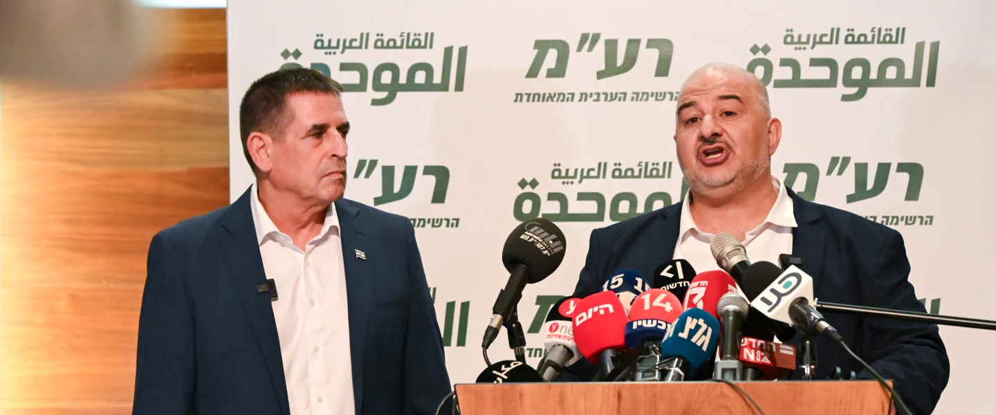 Ra'am head Mansour Abbas (right) holds a joint press conference with new party member Yoav Segalovich in Nazareth, Aug. 31, 2026. Photo by Michael Giladi/Flash90.