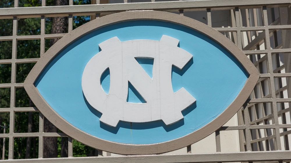 Logo plate at the University of North Carolina. Credit: Wayfarerlife/Shutterstock.