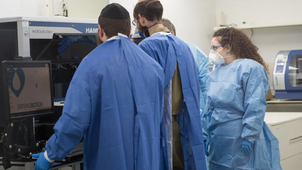 A special medical laboratory dedicated to processing COVID-19 test results of military personnel has been established by the IDF Medical Corps with the ability to analyse hundreds of test results each day. Credit: IDF Spokesperson’s Unit.