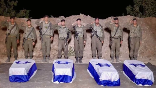 Israel Defense Forces soldiers receive coffins reportedly containing the bodies of four deceased hostages, Oct. 14, 2025. Credit: IDF.