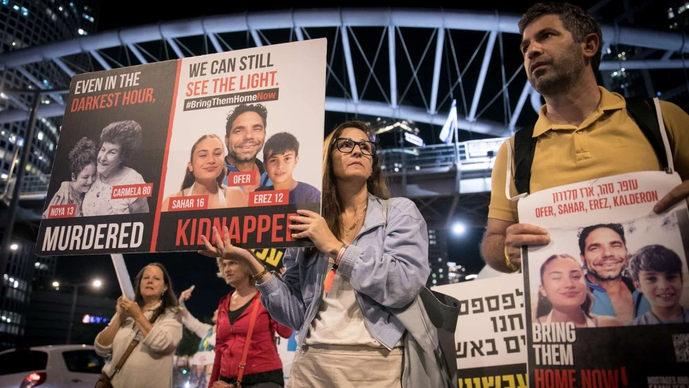 Israelis call for the release of hostages held by Hamas in the Gaza Strip, outside the Kirya military headquarters in Tel Aviv, Nov. 21, 2023. Photo by Miriam Alster/Flash90.
