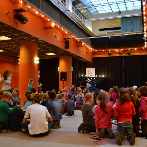 A Hanukkah celebration at the JCC in Budapest, known as the Balint House. Credit: JDC.