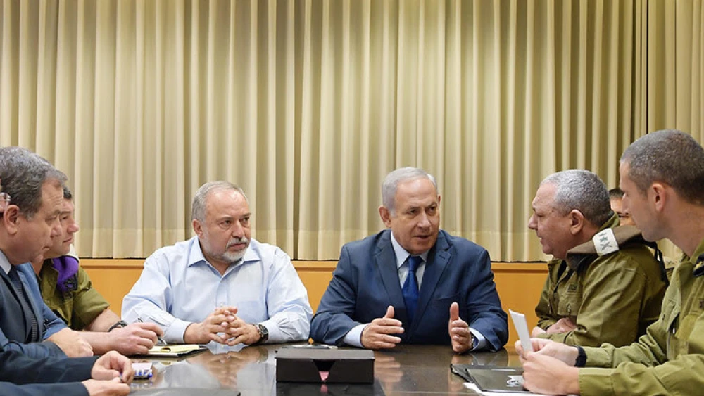 Israeli Prime Minister Benjamin Netanyahu holds a security consultation in Tel Aviv after the barrage of rocket fire from Hamas in Gaza. Credit: GPO/Amos Ben-Gershom.