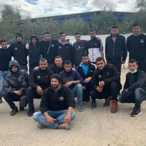 The Bedouin volunteers who fixed up a vandalized Jewish graveyard in the Negev. At left, in white, is Yochai, the cemetery’s caretaker. Photo courtesy of Desert Stars.