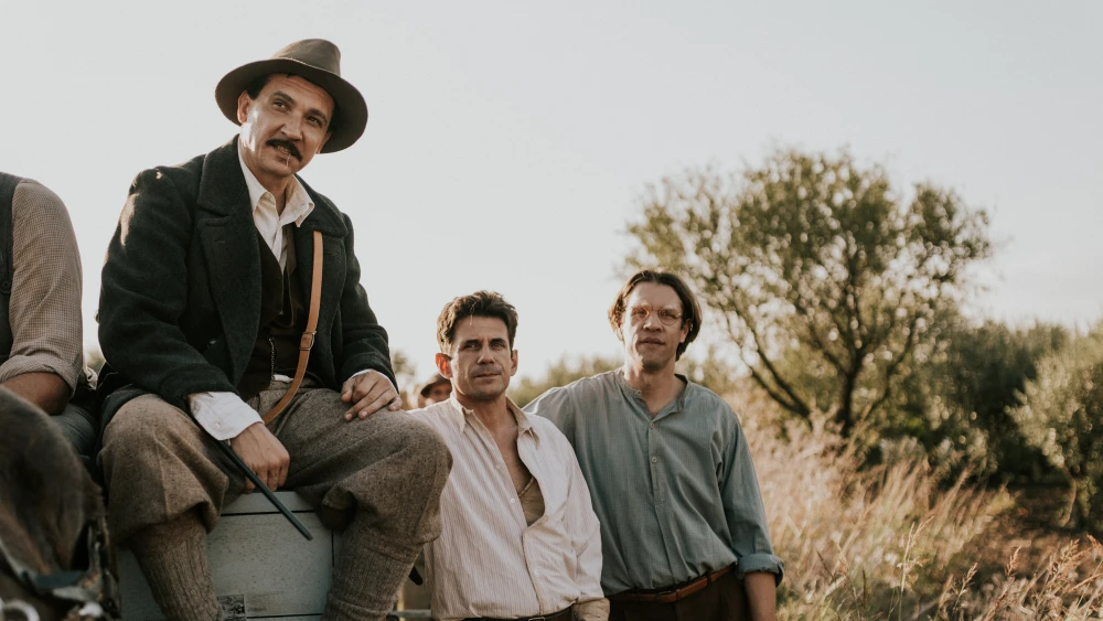 From left: The characters Globerman (played by Serhii Kysil), Moshe Rabinovich (played by Alban Ukaj) and Yaakov Scheinfeld (played by Marc Rissmann) in the Hebrew-English 2025 film “For the Love of a Woman.” Photo by Vincenzo Aluia ©2023 Colorado Film Production, Vivo Film.
