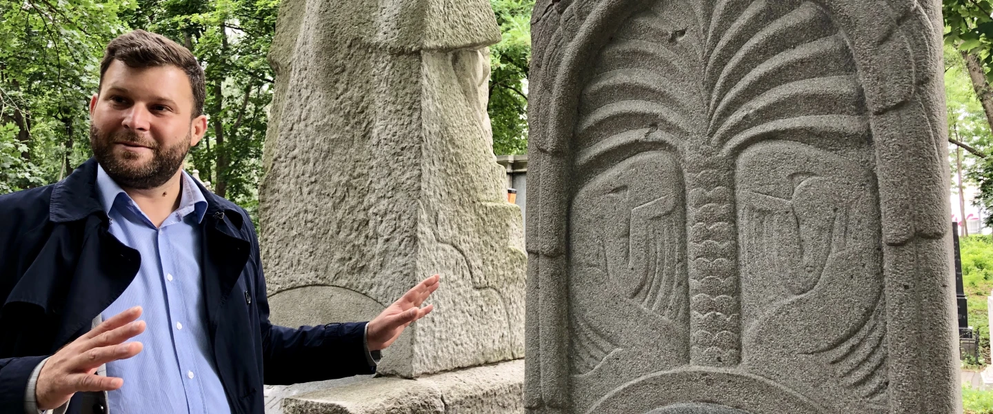 Michał Laszczkowski, CEO of Poland’s Cultural Heritage Foundation, gives a tour of the Jewish cemetery in Warsaw, July 2019. Photo by Eliana Rudee.