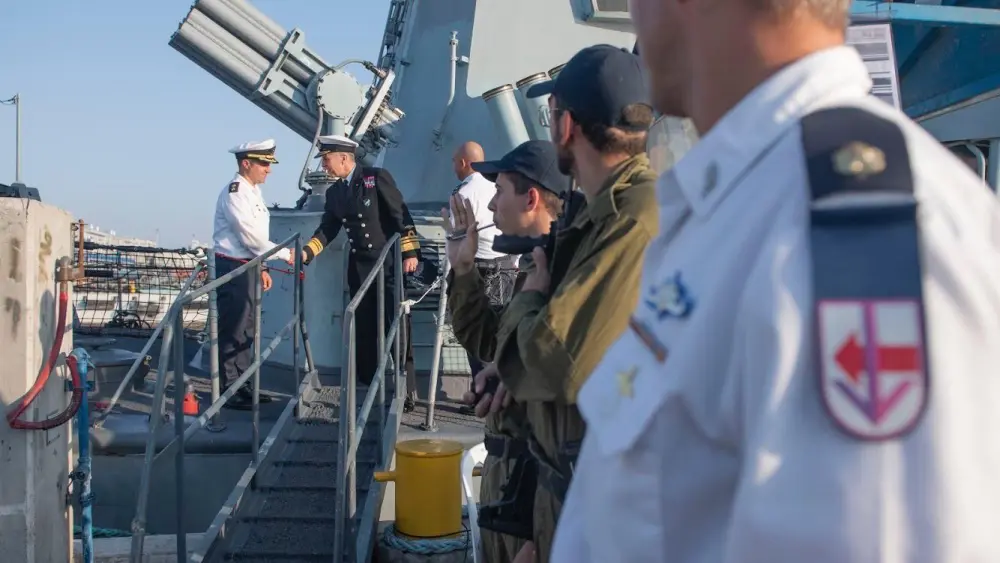 NATO and Israeli naval officials greet one another aboard an Israeli Navy ship. Credit: IDF Spokesperson's Unit.