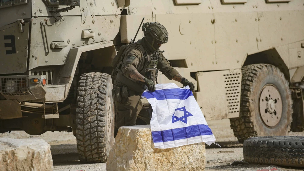 Israeli soldiers stand guard during a protest by Palestinians who were evacuated by the IDF from their homes in the Nur Shams refugee camp in Tulkarem, in the West Bank, on Dec. 15, 2025. Photo by Nasser Ishtayeh/Flash90.