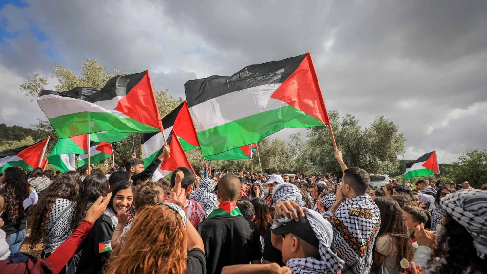 Israeli Arabs take part in a rally marking the "Nakba," a term used by Palestinians and their supporters to describe Israel’s creation, near Sakhnin in northern Israel, April 5, 2022. Photo by Jamal Awad/Flash90.