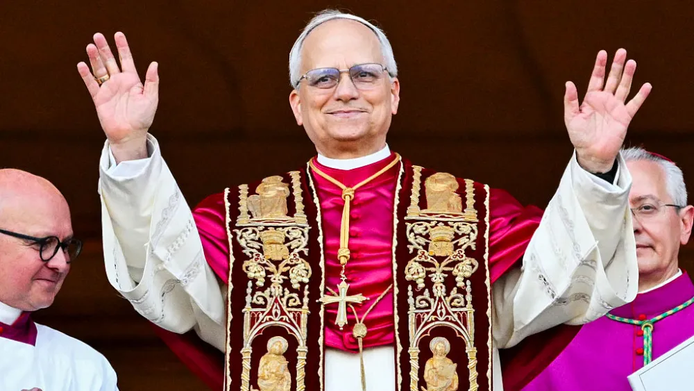 Newly elected Pope Leo XIV, Robert Prevost, arrives on the main central loggia balcony of St. Peter's Basilica, in the Vatican on May 8, 2025. Photo by Alberto Pizzoli/AFP via Getty Images.