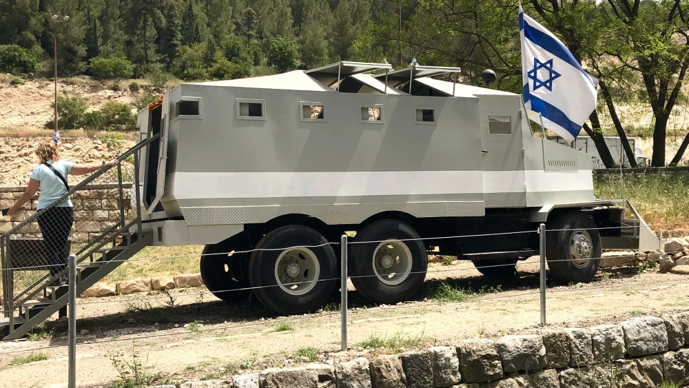 Armored convoy vehicle. Credit: Judy Lash Balint.